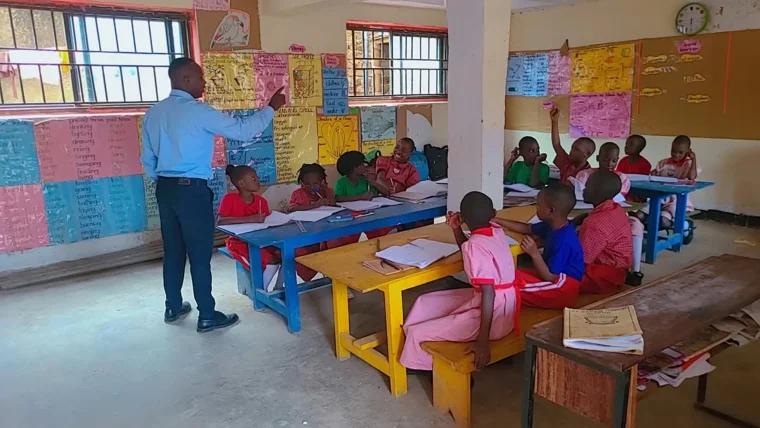 Children and their teacher together in the classroom