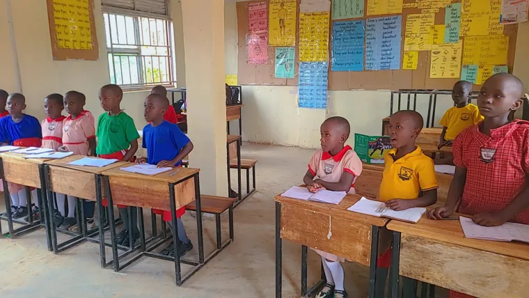 Pupils taking part in a classroom lesson
